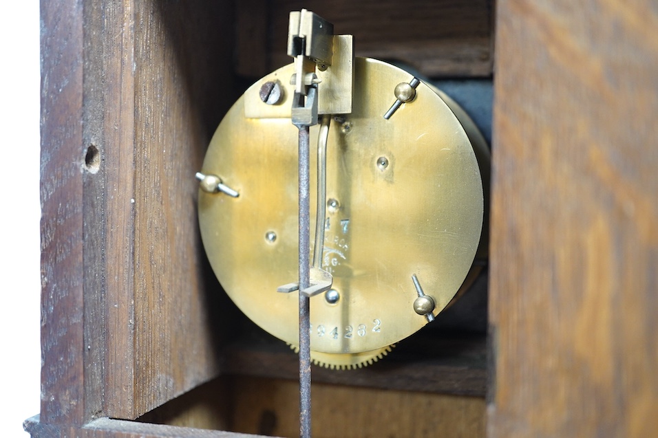 A miniature longcase clock and a miniature yew cylinder musical box, largest 42cm high. Condition - box poor, clock good